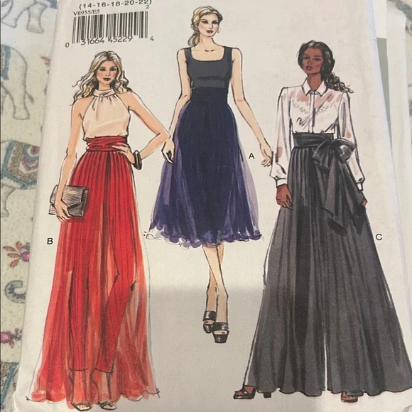 Vogue Fashion Patterns Collection with Red, Blue, and Gray Designs - Picture 7 of 7